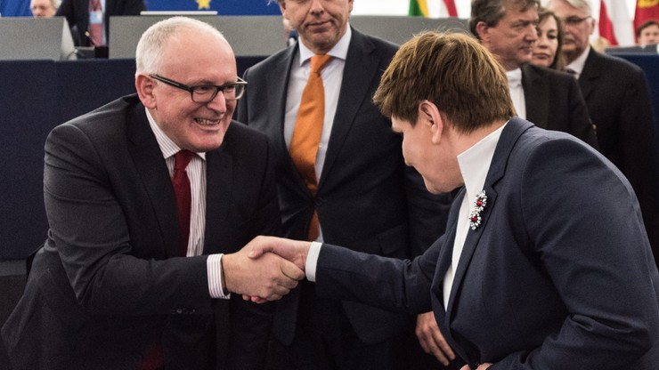 Timmermans zadowolony z tego, co usłyszał od Szydło